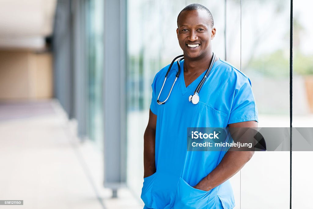 afro american medical doctor portrait of relaxed afro american medical doctor Nurse Stock Photo