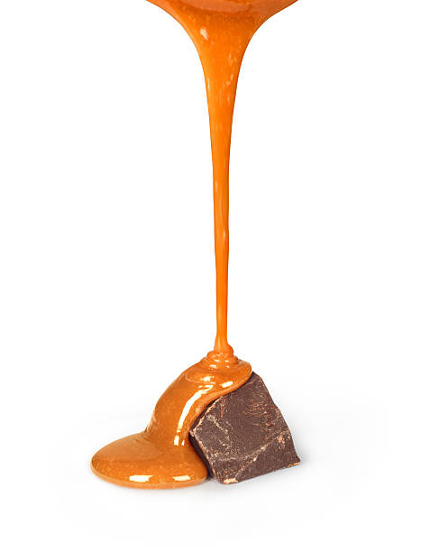 istock sweet caramel sauce is poured 518121606