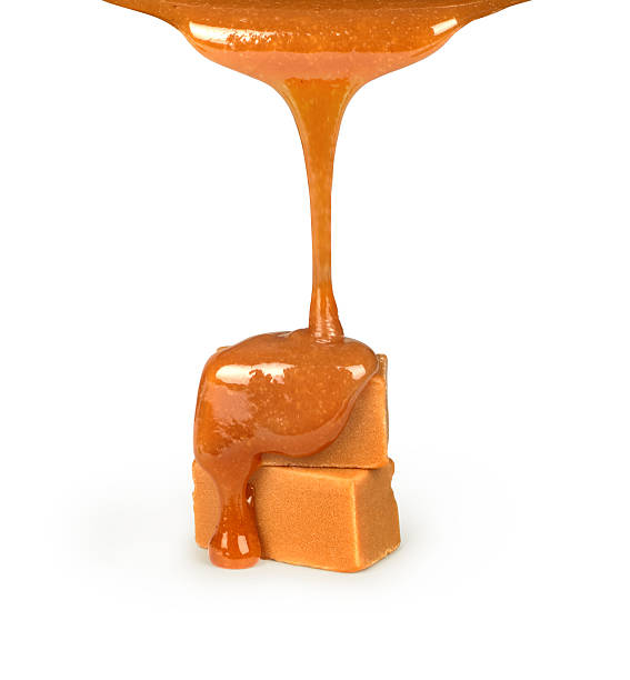 istock Caramel pouring on  candies 518121830
