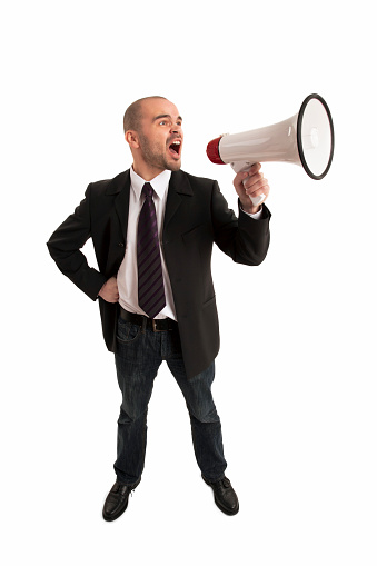 Businessman Shouting Through Megaphone on white background