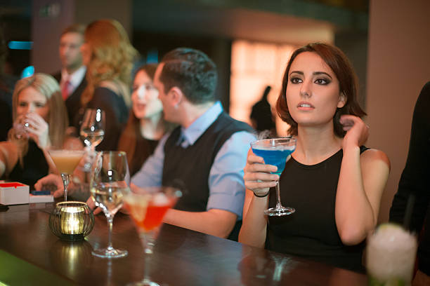 istock Drinking cocktails at nightclub 518137052