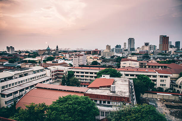 istock Manila skyline at sunset 518137660