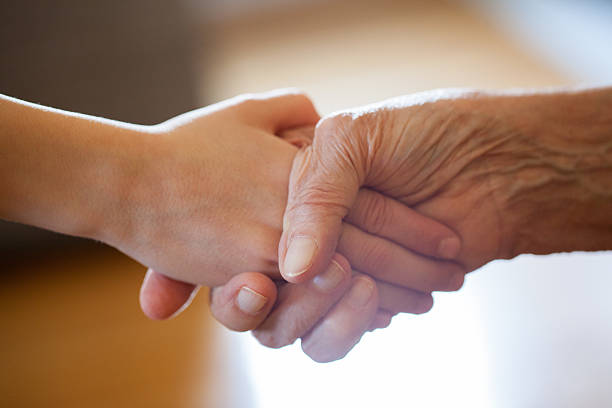 istock Grandson and granny handshake 518140684