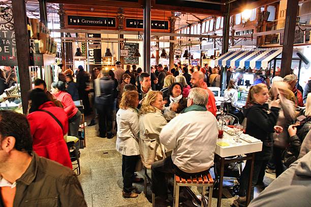 Madrid tapas place Madrid, Spain - October 21, 2012: People eat at Mercado San Miguel on October 21, 2012 in Madrid. According to Tripadvisor, it is the 2nd top shopping destination in Madrid. food court photos stock pictures, royalty-free photos & images