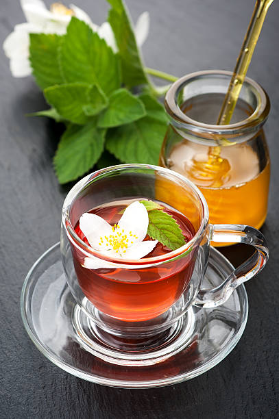 istock Herbal tea with mint, jasmine and honey. 518146941