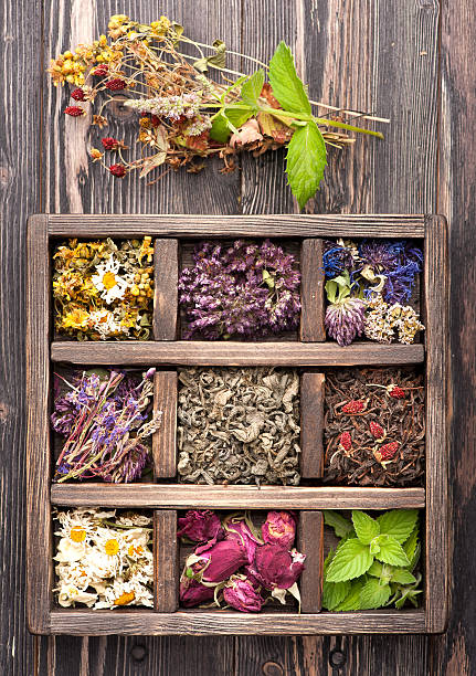 istock Dried Herbs and flowers in vintage box 518147219