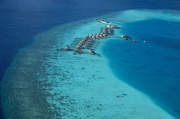 istock Aerial view overwater holiday villas 518147239