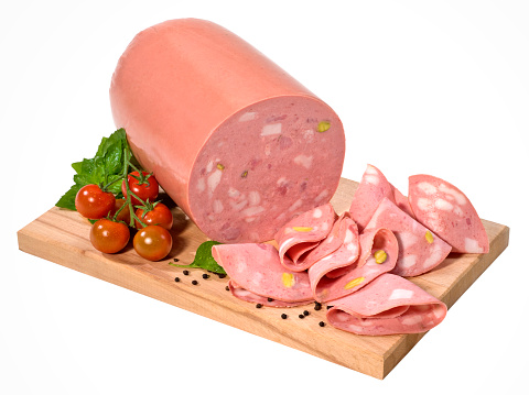 Mortadella loaf and slices on a cutting board,isolated on white with clipping path.