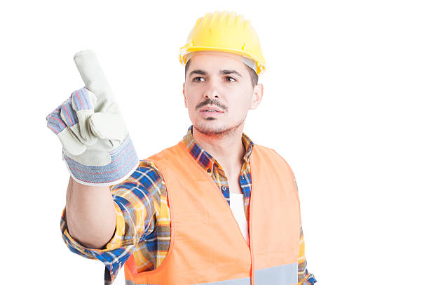 istock Portrait of engineer pointing finger at something 518148156