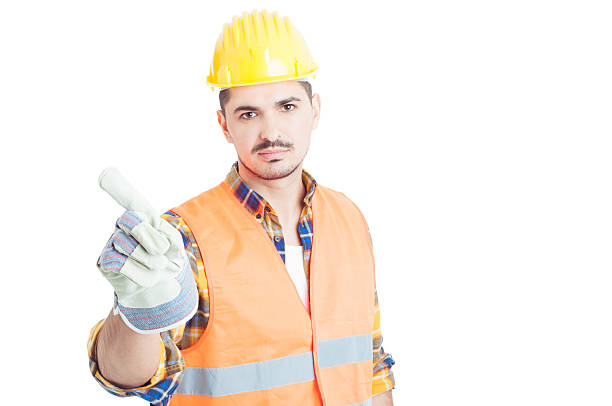 istock Serious engineer doing no or denial gesture with his finger 518148176