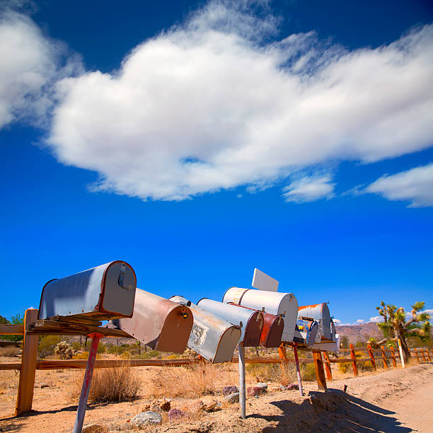 istock Grunge mail boxes in a row at California Mohave desert 518148351