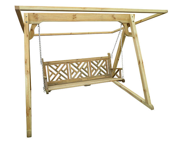 istock Brown wooden garden swing isolated over white background 518149094
