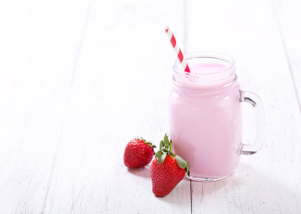 istock jar of strawberry smoothie 518149288