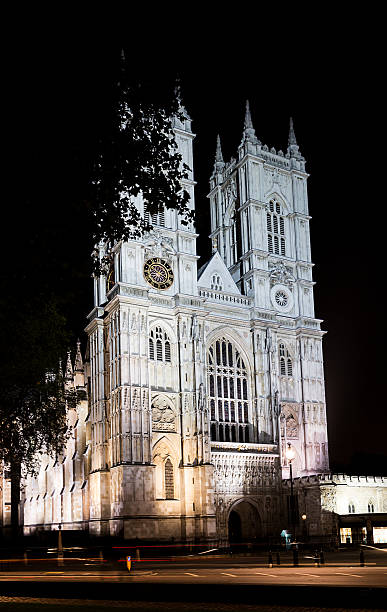 istock Westminster abbey, London, England, at night 518149789