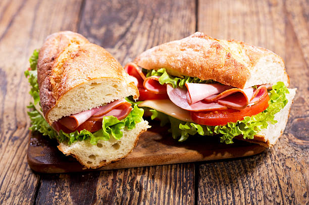 istock two sandwiches with ham and vegetables 518149918