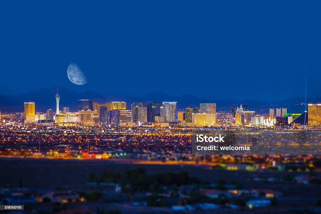 Las Vegas Strip and Moon Las Vegas Strip and the Moon. Las Vegas Panorama at Night. Nevada, United States. Las Vegas Stock Photo