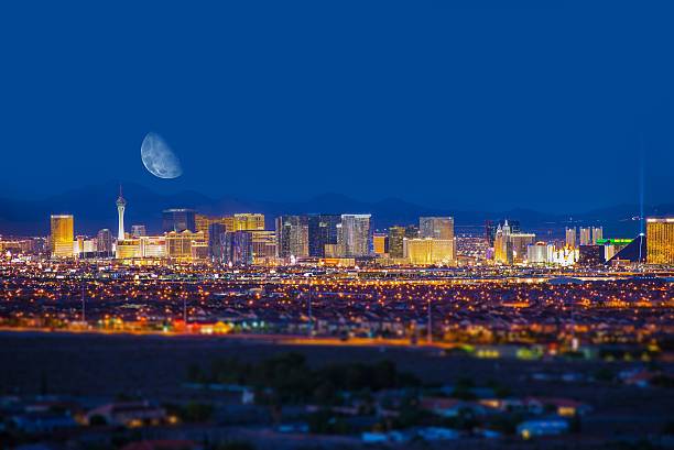 Las Vegas Strip and Moon Las Vegas Strip and the Moon. Las Vegas Panorama at Night. Nevada, United States. las vegas photos stock pictures, royalty-free photos & images