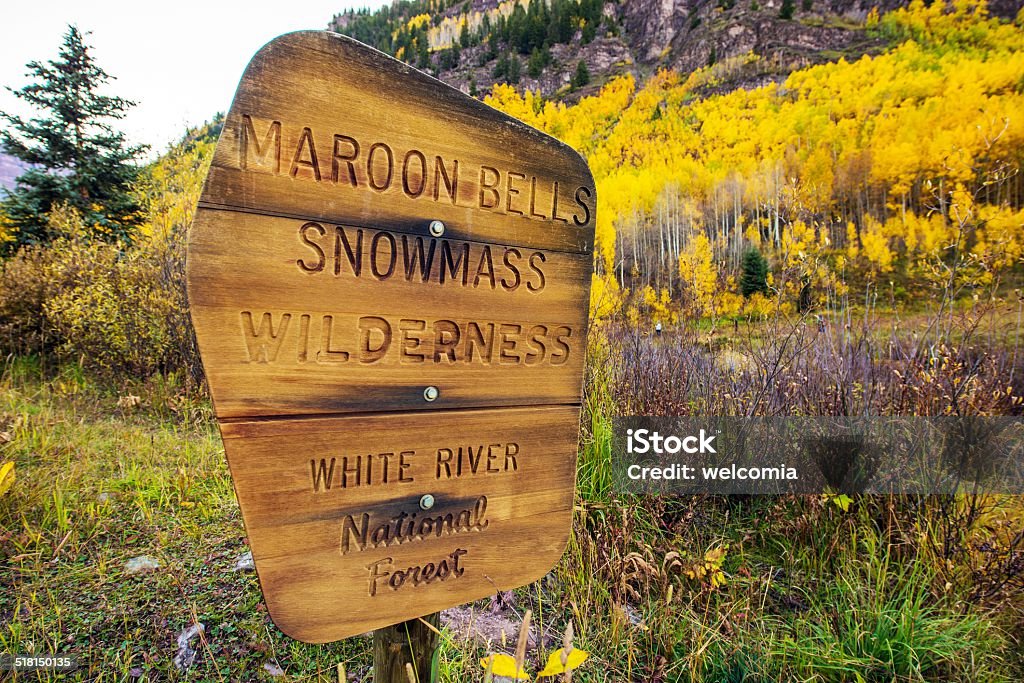 Snowmass Wilderness Maroon Bells Snowmass Wilderness - White River National Forest Wooden Sign near Maroon Bells, Aspen, Colorado, United States. Hiking Stock Photo