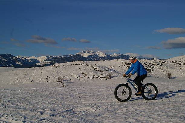 istock Cyclist riding a fat bike on snow 518150137