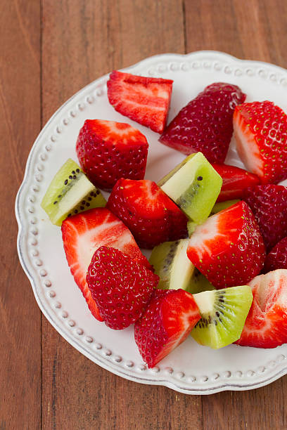istock strawberry with kiwi on the plate 518150145