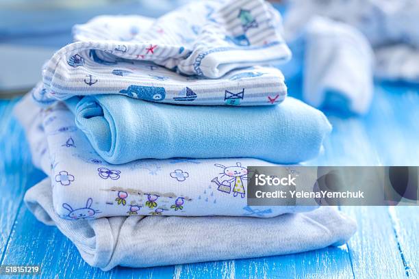 Baby Clothes Stock Photo - Download Image Now - Baby Clothing, Folded, Garment