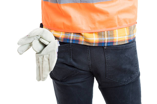 istock Closeup of young constructor back posing in uniform or equipment 518151340