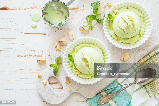 Pistachio Ice Cream In White Bowl Stock Photo - Download Image Now - Dessert - Sweet Food, Pistachio, Above