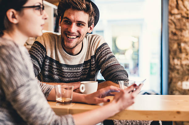 istock Young couple having fun at the coffee shop 518151546