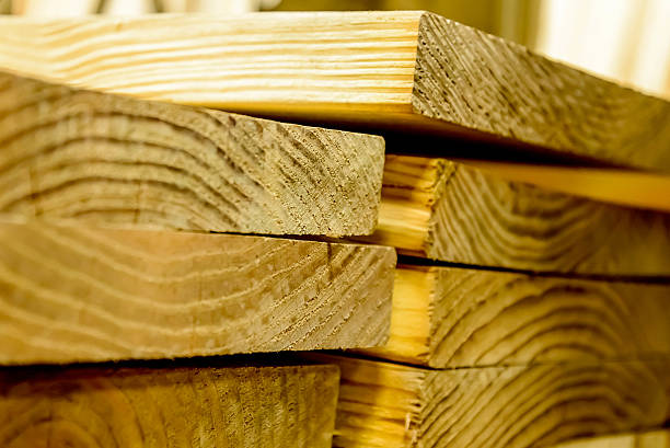 istock stacked wood boards for building construction 518153481