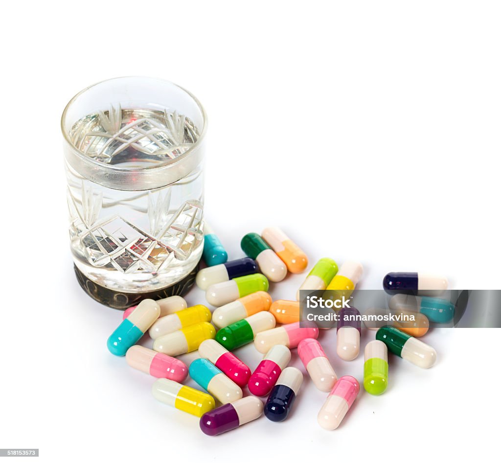 Medicals and alcohol Medicals and alcohol on a white background Addiction Stock Photo