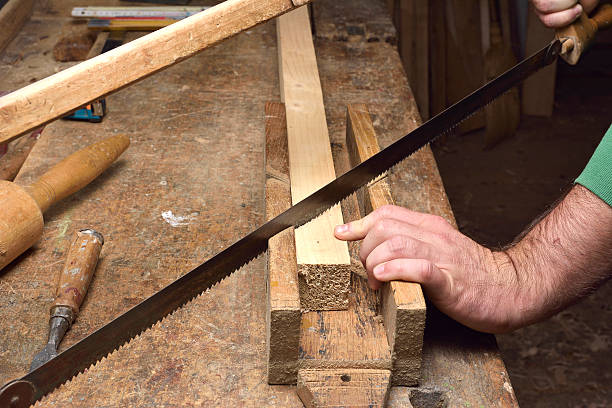 istock carpenter working with plane on wooden 518171472
