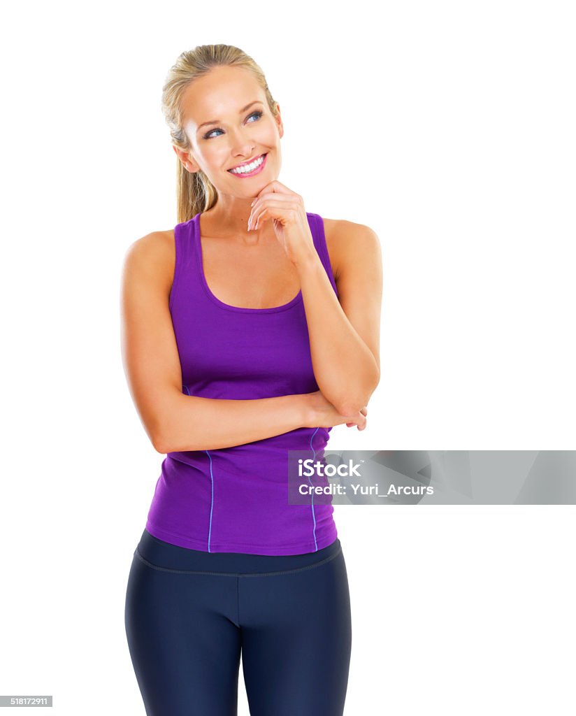 Fitness is for the mind as well as the body Studio shot of an attractive young woman in exercise clothing against a white background - this is an alternative version of iStock file 47184368 20-29 Years Stock Photo