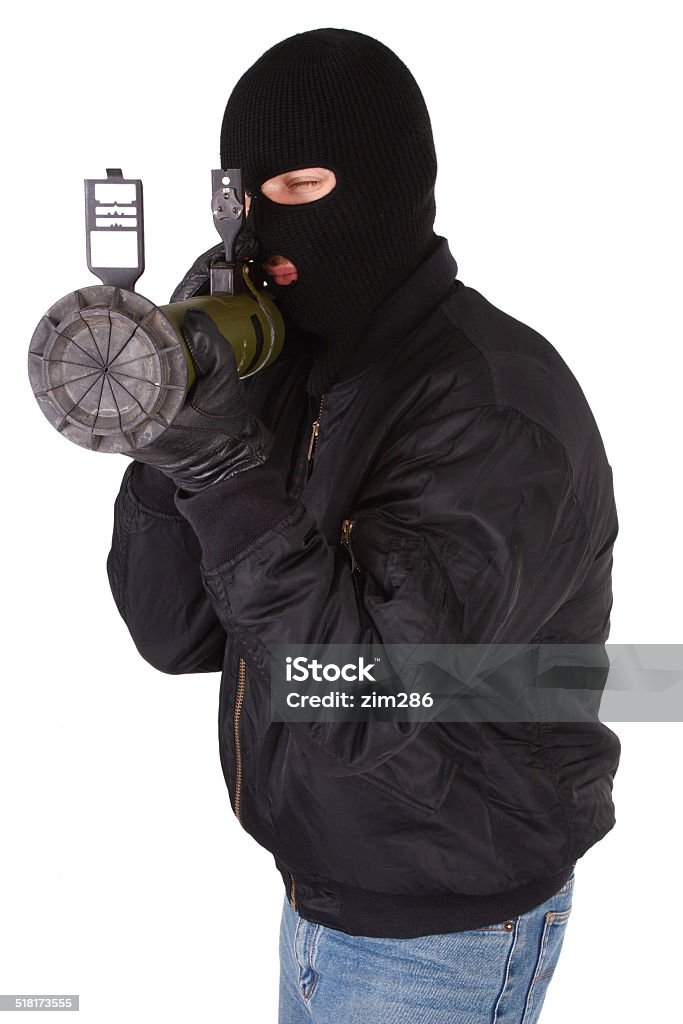 terrorist with bazooka grenade launcher terrorist with bazooka grenade launcher isolated on white bacground Adult Stock Photo