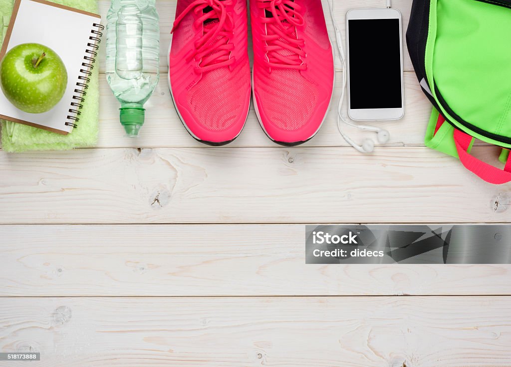 Sport and fitness concept on wooden planks background Sport and fitness concept on bleached wooden planks background Exercising Stock Photo