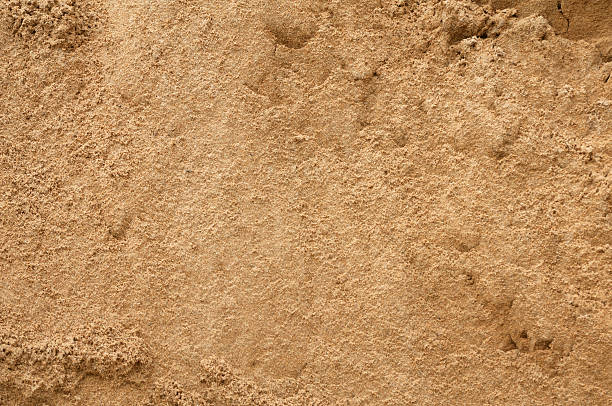 istock Texture of old wall covered with yellow stucco 518173953