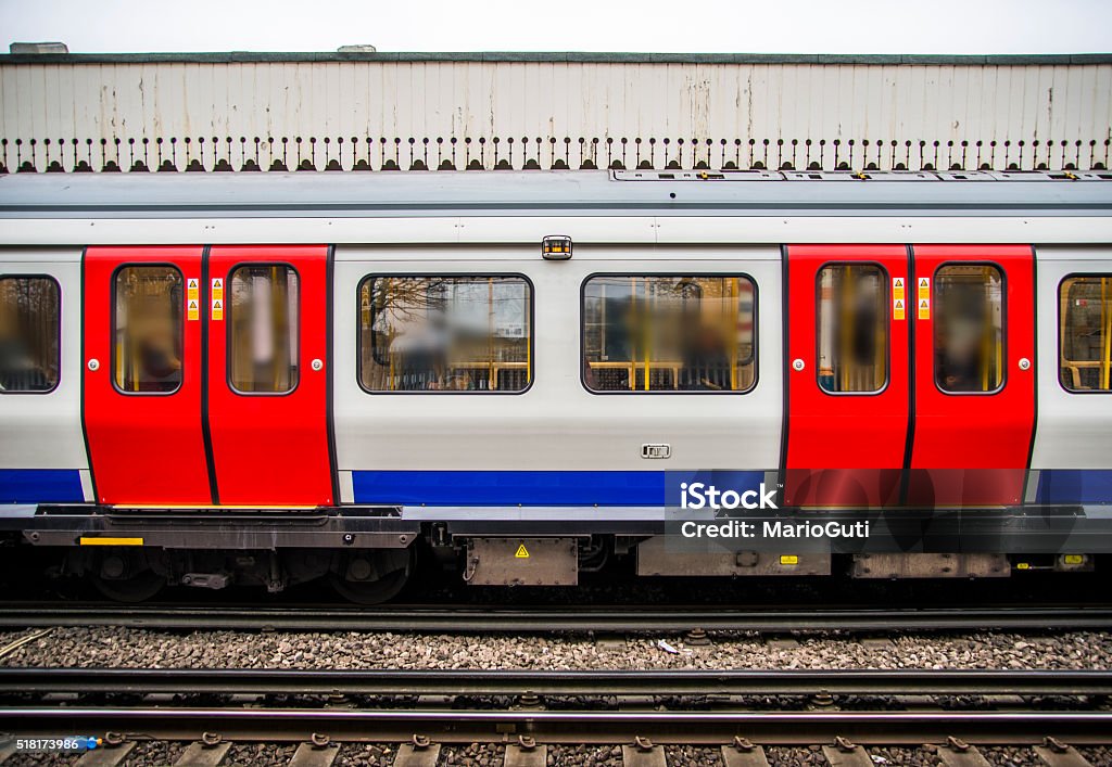 London's Underground A train stopped in one of the stations of London's tube. Paris Metro Stock Photo