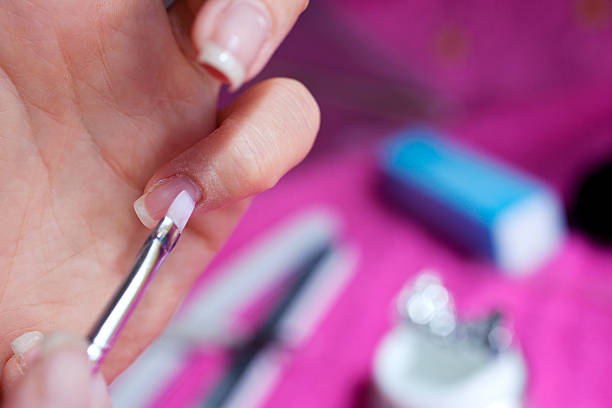 istock Woman painting her nails 518174005