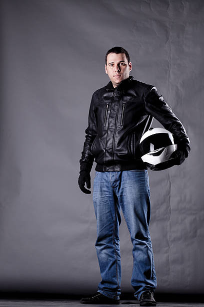 istock motorist with a helmet, leather jacket and jeans 518174514