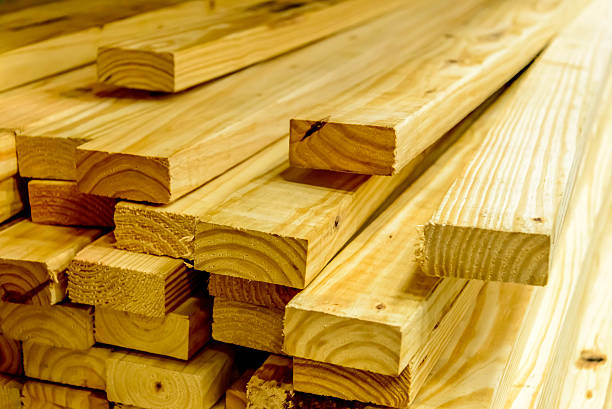 istock stacked wood boards for building construction 518174715