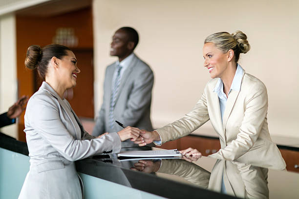 businessman check in at hotel reception