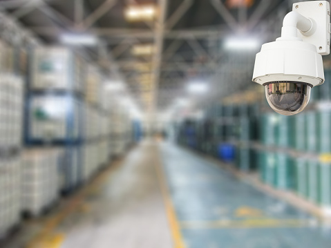 CCTV system security products chemical in warehouse of factory blur background.