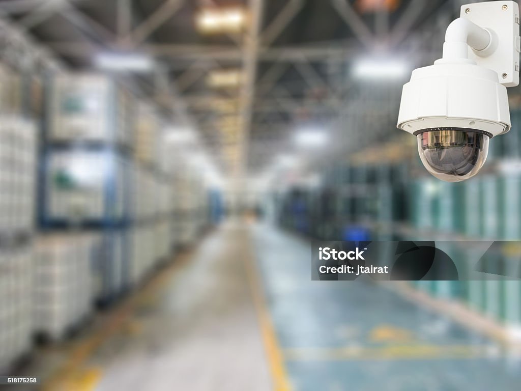 CCTV camera system. CCTV system security products chemical in warehouse of factory blur background. Security Camera Stock Photo