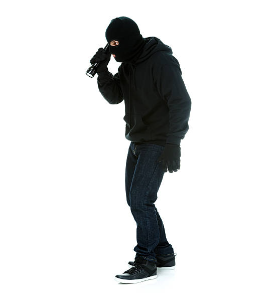 robber в действии с флэш-света - unrecognizable person flash стоковые фото и изображения