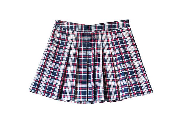 Skirt Pleated plaid school uniform skirt on white background kilt stock pictures, royalty-free photos & images