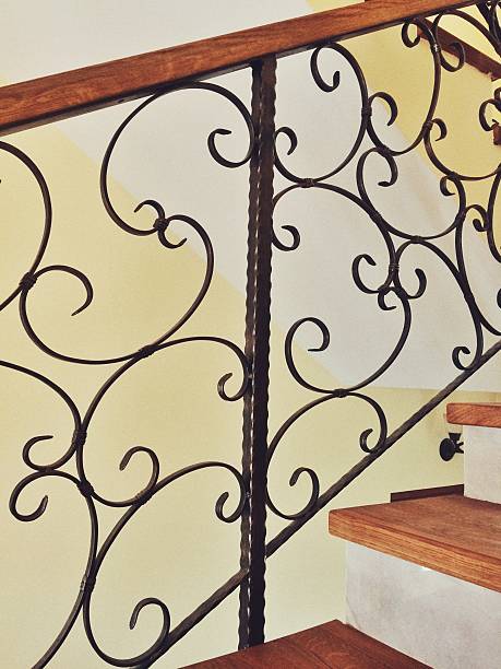 istock Marble staircase with black wrought iron railing 518180106