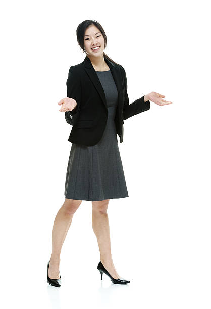 istock Smiling businesswoman presenting 518183462