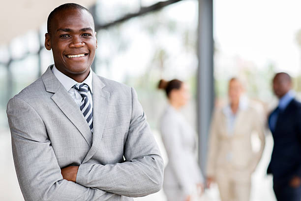 istock black businessman executive looking at the camera 518184056