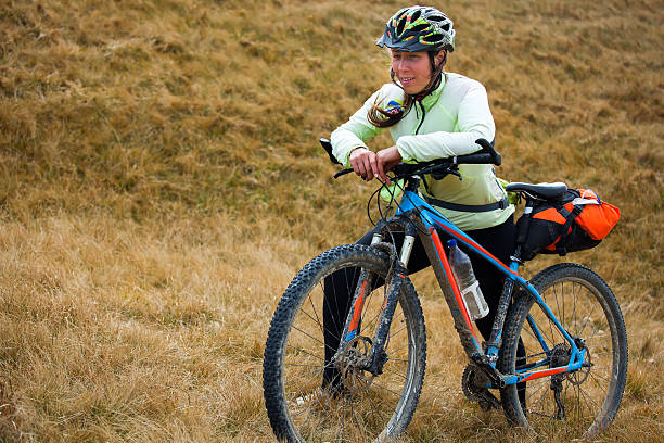 istock Biker riding in autumn mountains 518184588