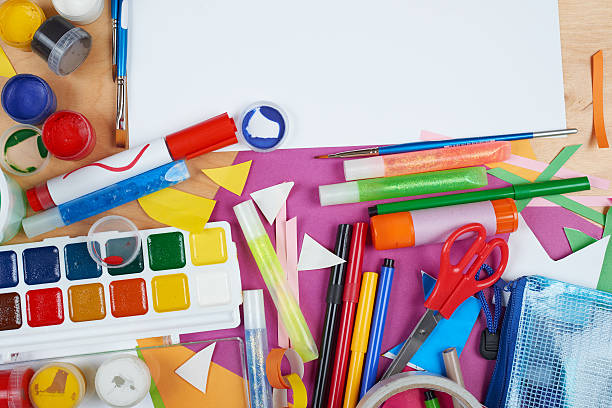 istock artwork workplace with creative accessories, art tools for painting 518185504