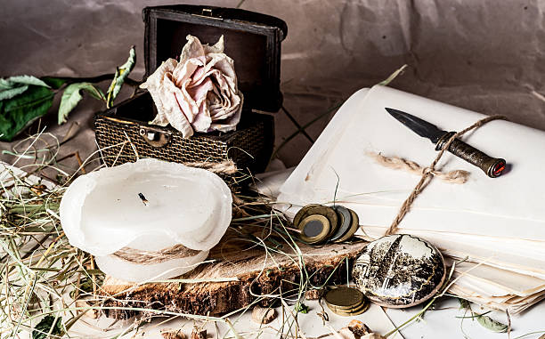 istock candle and old things on the table 518197446